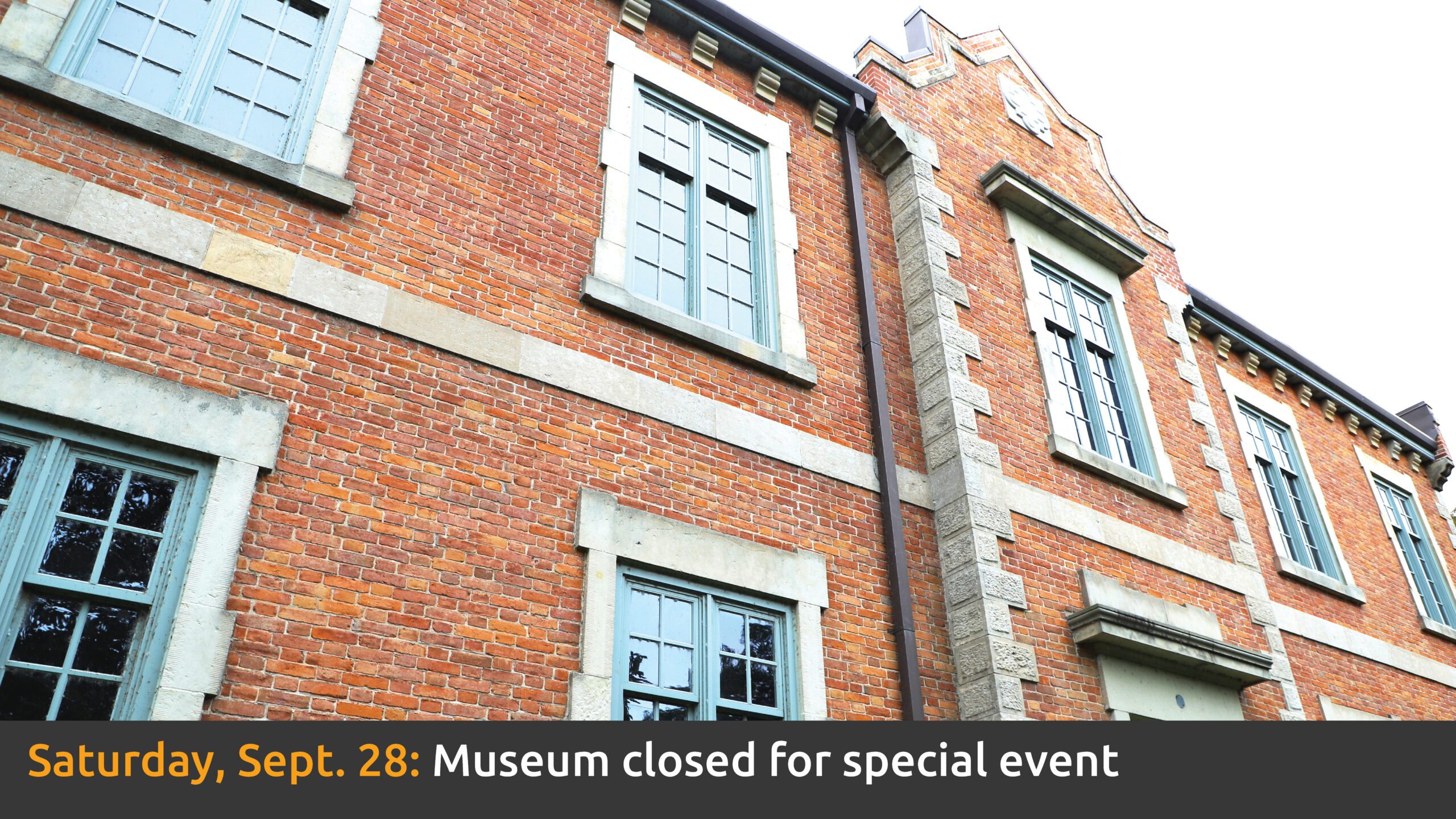 Photo of the exterior of the Museum with text promoting the museum will be closed on Sept. 28